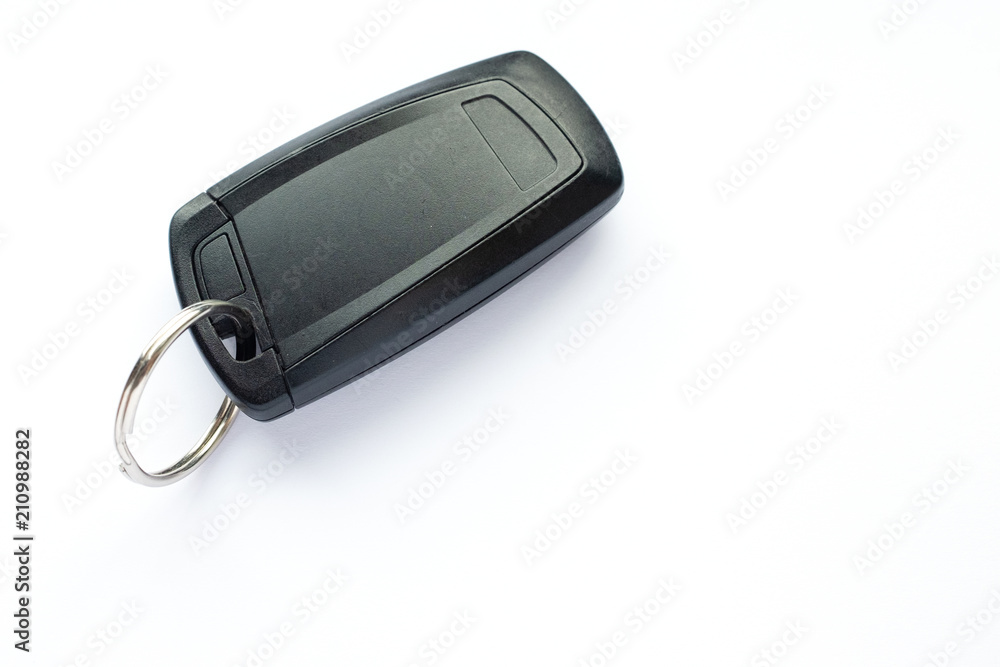 Electronic black car key on white background Electronic black car key on white background