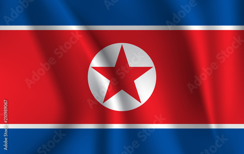 Flag of North Korea. Realistic waving flag of Democratic People's Republic of Korea. Fabric textured flowing flag of DPRK.