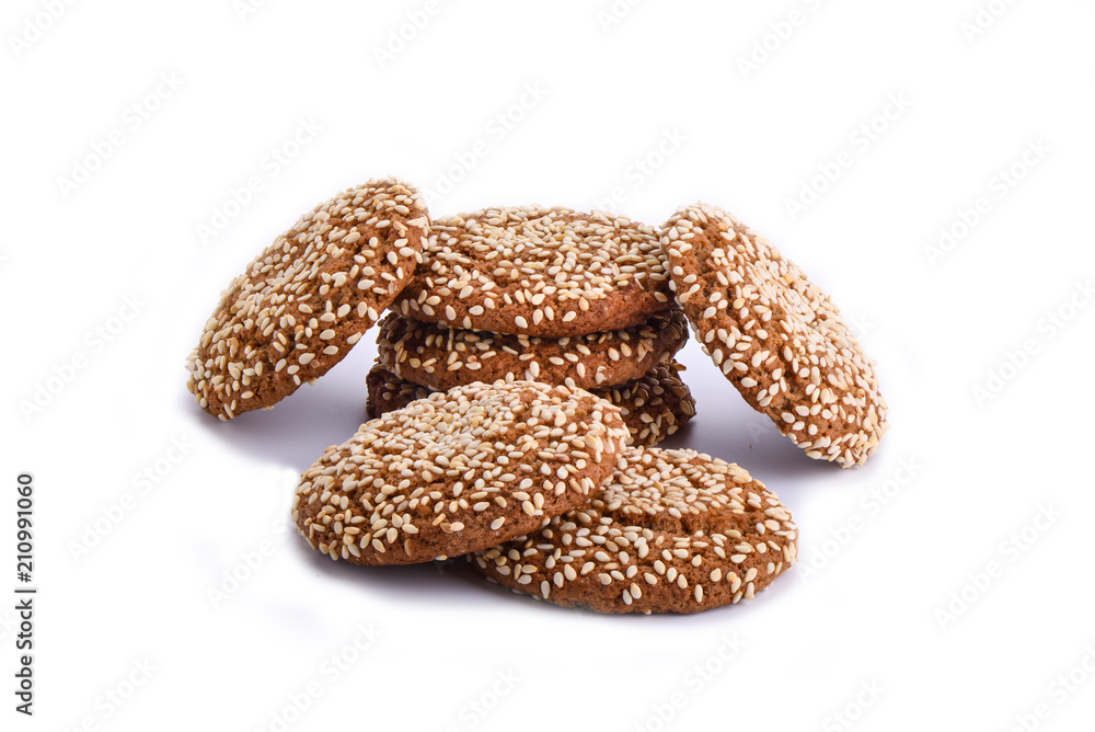 Oatmeal cookies with sesame seeds isolated on white background