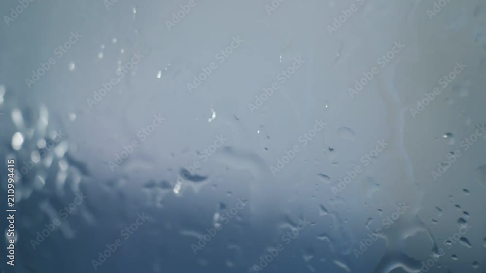 water drops on glass closeup.abstract background. water drops on glass closeup.abstract background.