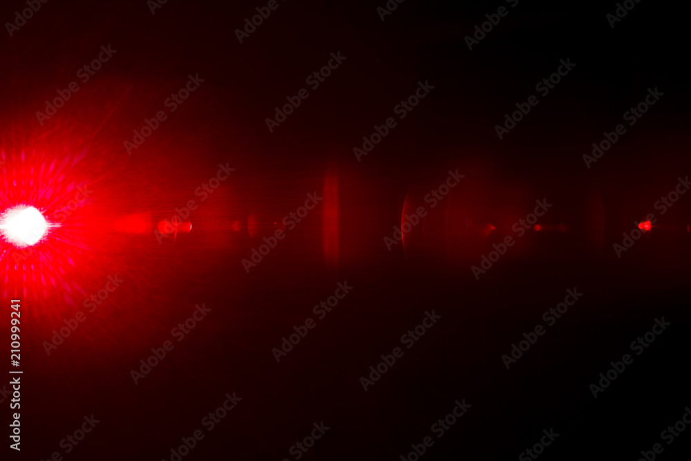 Camera lens flare by laser light create circles of objective and