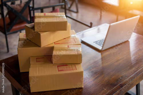 Konstfotografi Packing accessories at workplace of startup small business owner, cardboard parcel box for online selling