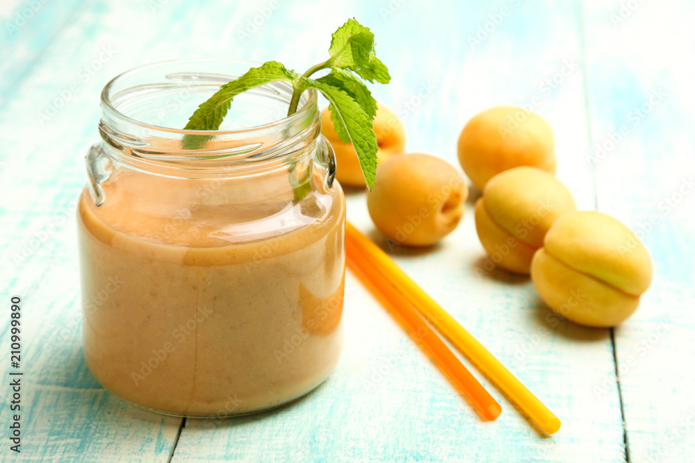 Apricot smoothies in a glass jar Apricot smoothies in a glass jar