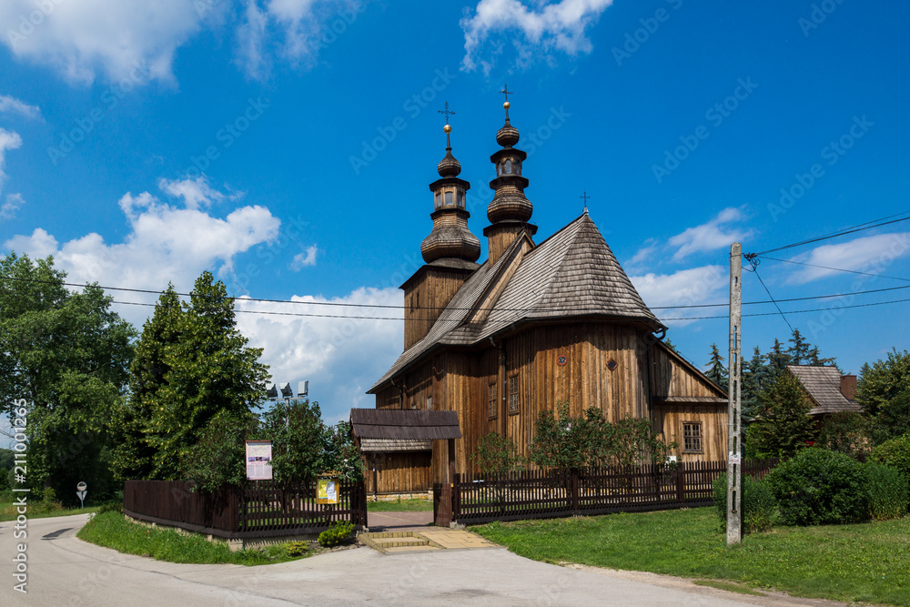 Fototapeta premium Wooden church in Biorkow Wielki, Malopolska, Poland