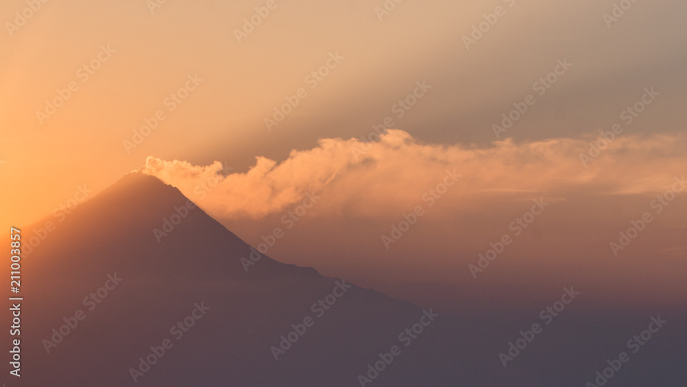 Mount Merapi erupting at sunrise Mount Merapi erupting at sunrise