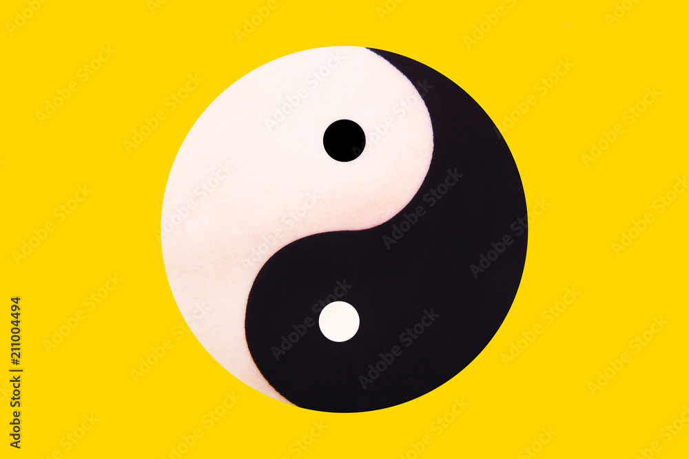 Ying yang symbol of harmony and balance on the yellow Ying yang symbol of harmony and balance on the yellow