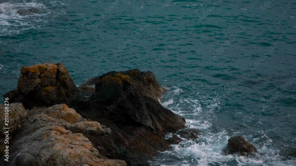 Ocean Waves Washing Against A Rock in the Pacific Northwest