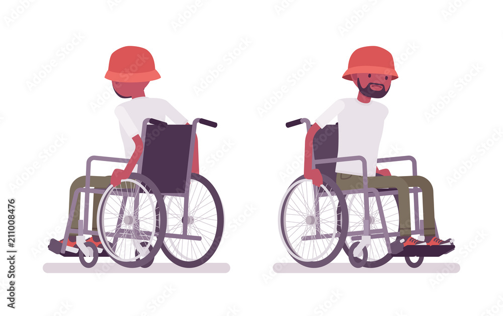 Male black young wheelchair user moving manual chair