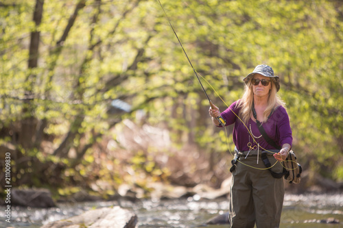 Full Figured Adult Woman Fishing