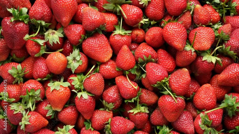 Background top view 4k video of strawberries rotating Background top view 4k video of strawberries rotating