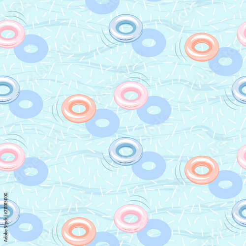 Floating pool inflatable rings seamless vector pattern. Rubber hoops on blue water background.