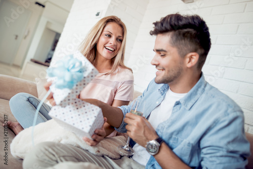 Happy couple having romantic date at home