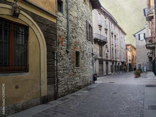 Fototapeta Naklejka Na Ścianę i Meble -  beautiful stone houses in Como downtown.Lombardy, Italy