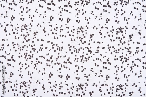 Abstract pattern with dark stains and dots on white background © LIGHTFIELD STUDIOS