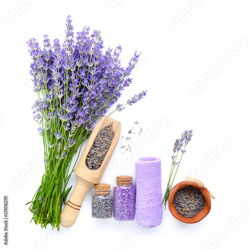 Natural cosmetics with flowers of lavender on white background