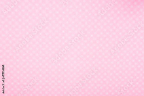 Texture of polka dot pattern on pink background © LIGHTFIELD STUDIOS