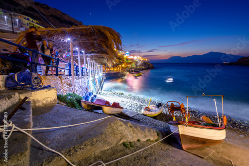 Fototapeta Naklejka Na Ścianę i Meble -  Beautiful Matala beach and village at night, Crete Island, Greece