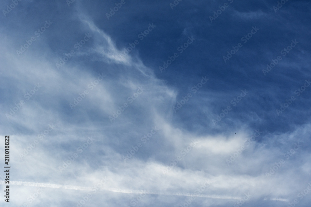 Beautiful cirrus clouds against the blue sky