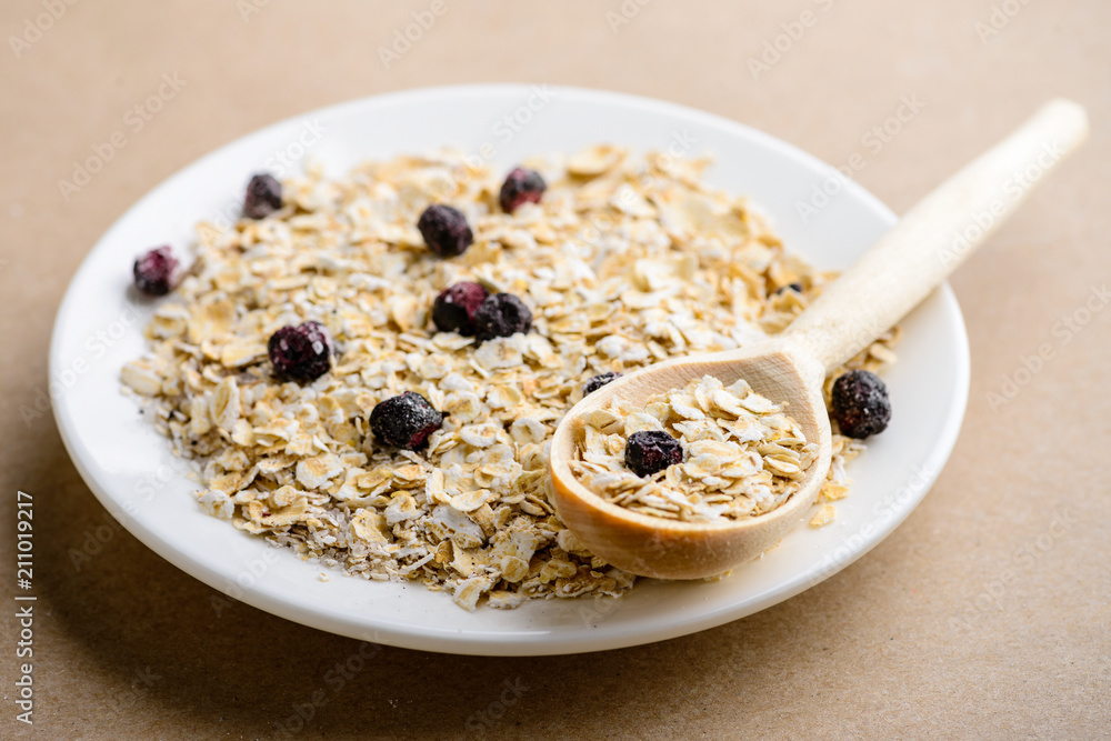 Tasty healthy and dietary breakfast: homemade oatmeal with black