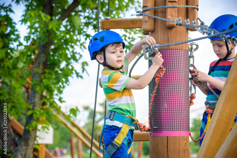 Young boy playing and having fun doing activities outdoors. Happiness and happy childhood concept Young boy playing and having fun doing activities outdoors. Happiness and happy childhood concept