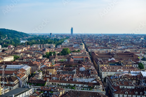 View of the whole of a city from the heights seeing the streets and squares in perspective. Photograph taken in Turin, Italy.