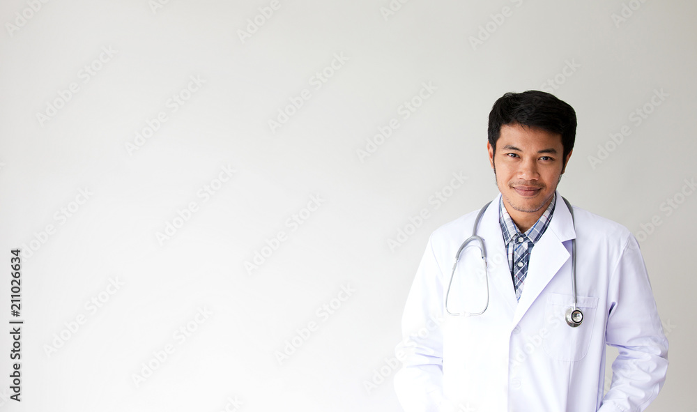 Portrait of smiling male doctor. Friendly young man doctor with a stethoscope around on neck. asian people. Portrait of smiling male doctor. Friendly young man doctor with a stethoscope around on neck. asian people.