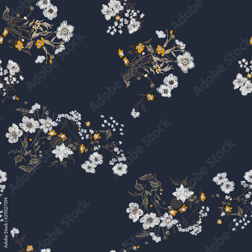 Flower seamless pattern. Field herbs daisy textile print decoration dark blue background. Cute Floral pattern in the small flower. Motifs scattered random.  Elegant template for fashion prints.