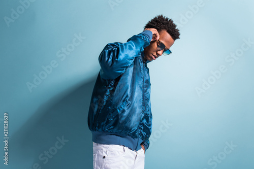 Anonymous black man in blue outfit photo