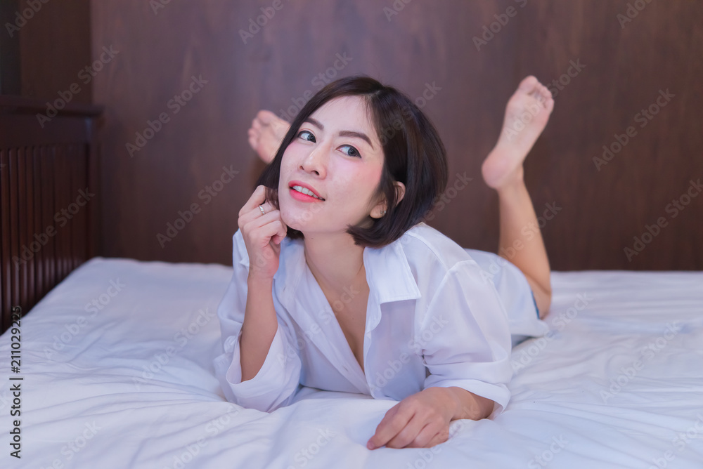 Portrait of beautiful asian sexy woman in the bedroom,Thailand people,Pose for take a picture, Portrait of beautiful asian sexy woman in the bedroom,Thailand people,Pose for take a picture,