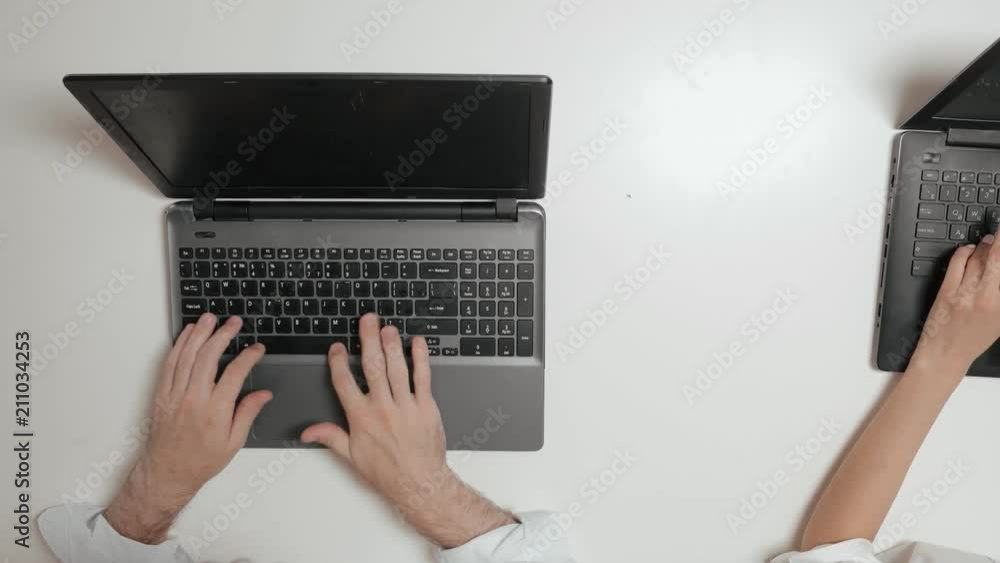 Angry bank employee smashing and breaking computer. Angry bank employee smashing and breaking computer.