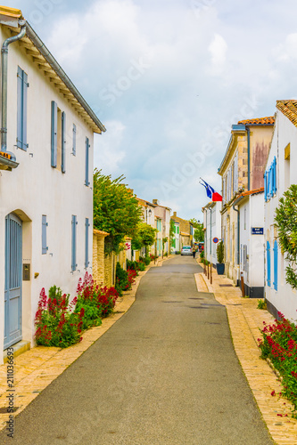 Fototapeta Naklejka Na Ścianę i Meble -  A street at Les Portes en Re village situated on Ile de Re, France