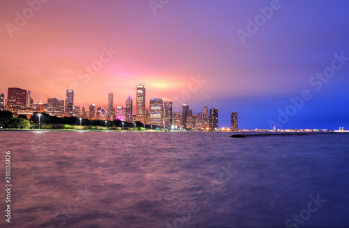 Chicago, Illinois, USA - June 22, 2018 - The Chicago skyline at night after a storm across Lake Michigan. © Jbyard