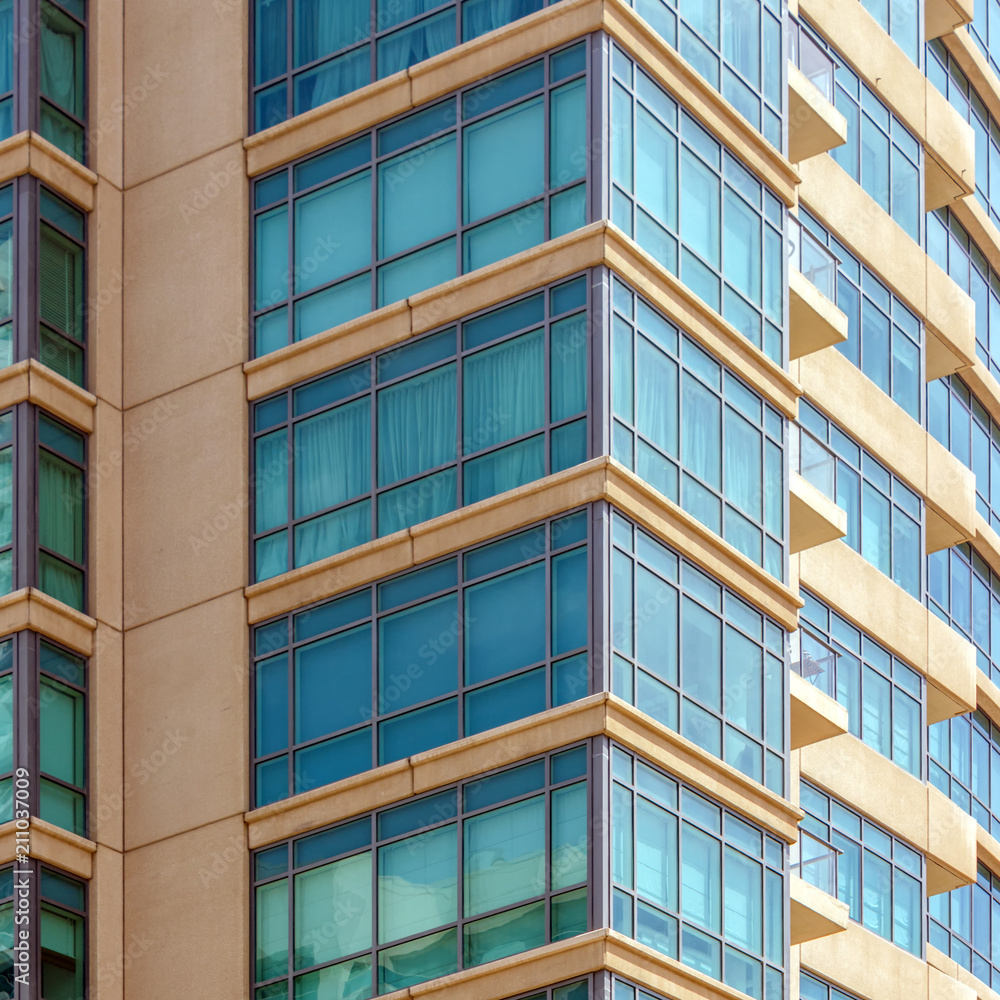 A view from below of high skyscrapers in the business district. Appearance of modern office buildings in the metropolitan city.