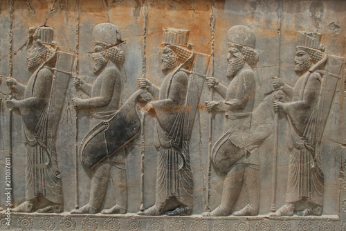 Carving Medes and Persians from the Apadana palace  in Persepolis, Iran photo