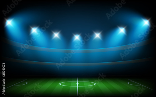 Soccer arena illuminated with spot lights