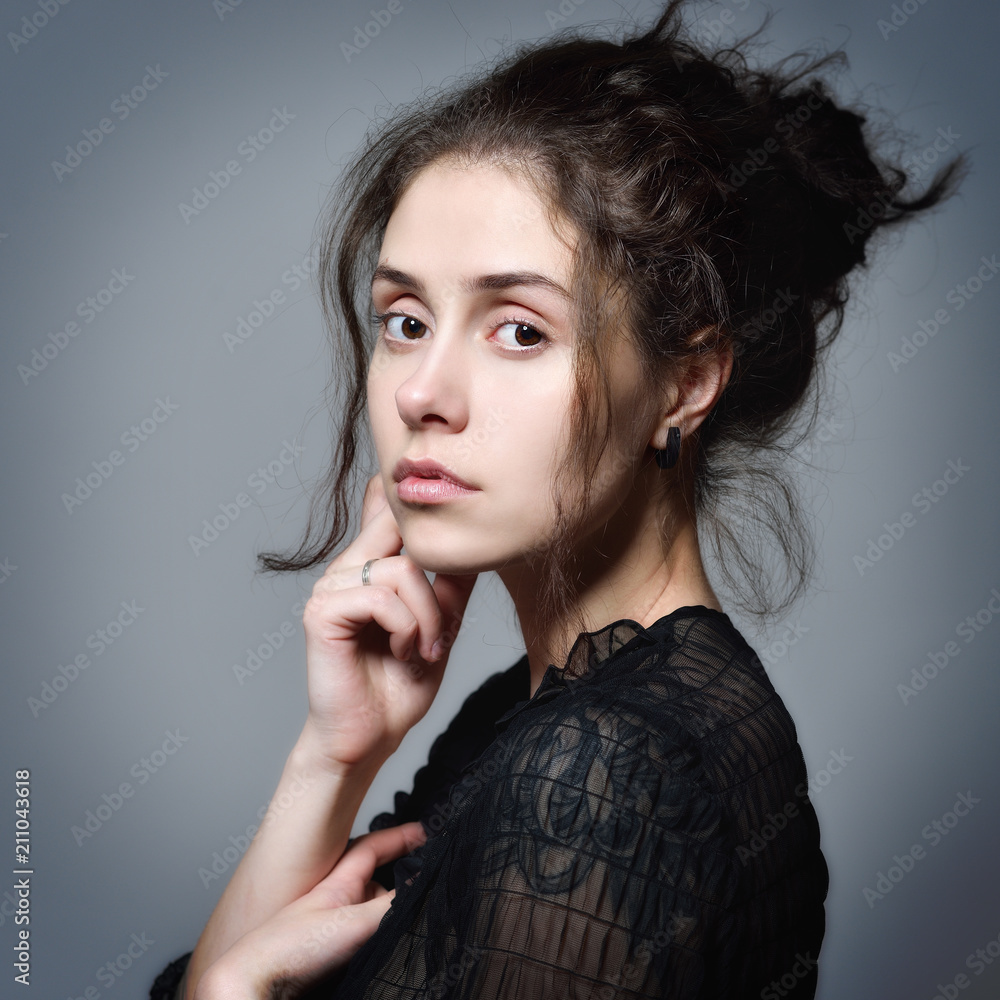 beautiful woman with curve hair in black ransparent blouse posing. beautiful woman with curve hair in black ransparent blouse posing.
