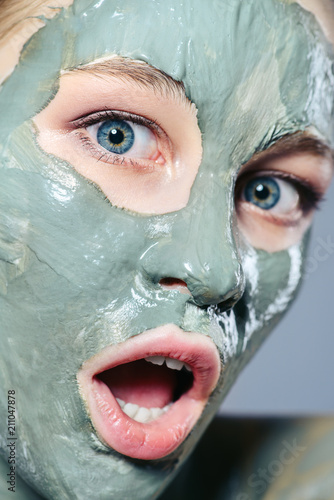 surprised girl in facial mask