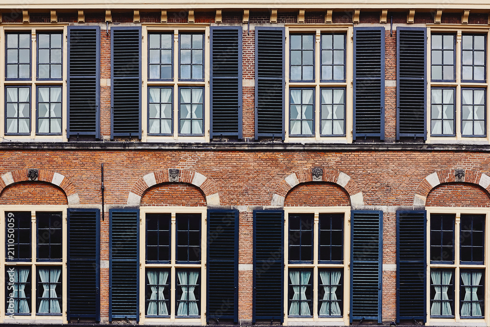 Facade of the ancient building made of red brick Facade of the ancient building made of red brick