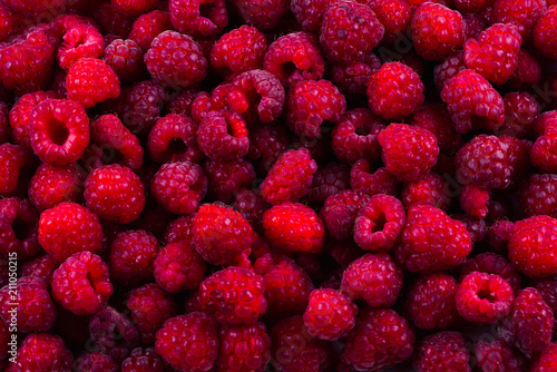 Fresh raspberries background.  Closeup photo  top view.