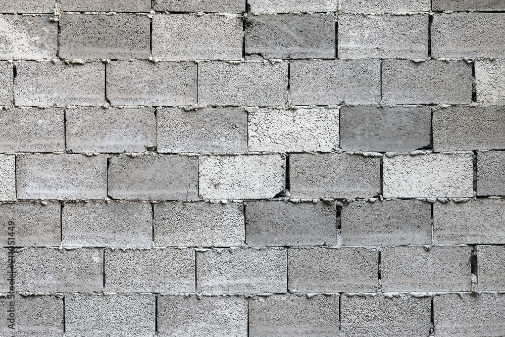 Obraz premium Grey brick wall (cinder block), texture