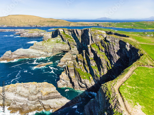 Amazing wave lashed Kerry Cliffs, widely accepted as the most spectacular cliffs in County Kerry, Ireland photo