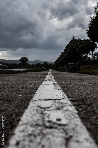 White line on a pathway.