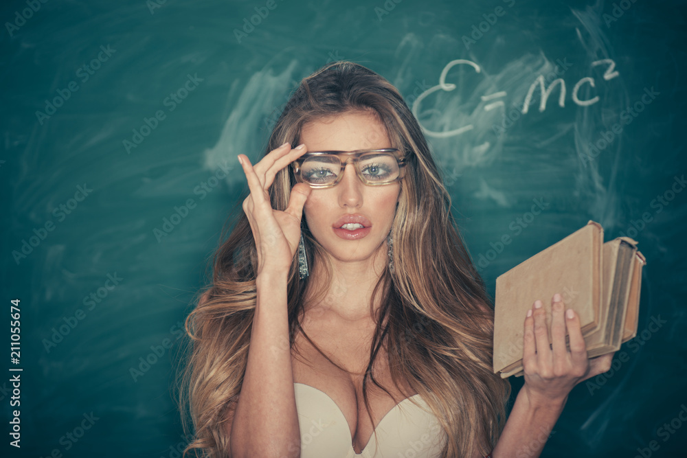 Confident and sexy teacher. Sensual woman adjust glasses on makeup face. School and education for adult. Woman with long blond hair in bra pose at chalkboard. Sexi bookworm. Back to school - obrazy, fototapety, plakaty 