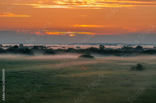 Natural Park of Biebrza Valley - sunrise over medow and pool