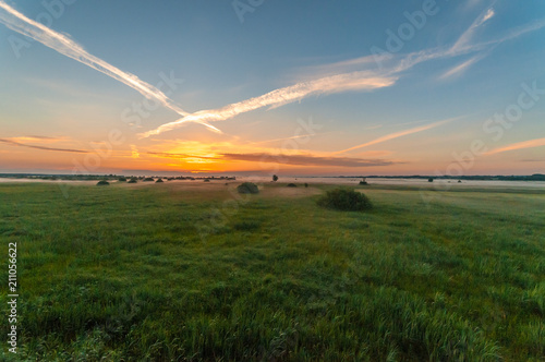 Natural Park of Biebrza Valley - sunrise over medow and pool