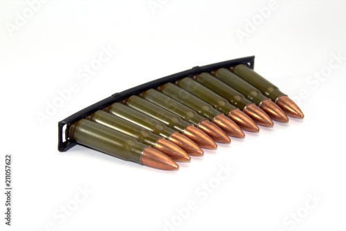 clip with cartridges 7,62 on 39 for a self-loading carbine of Simonov on white background close-up