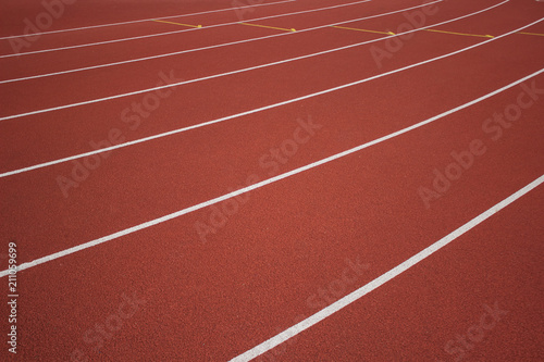 soft focus empty red running road track background texture concept with marking of white line and space for copy or text