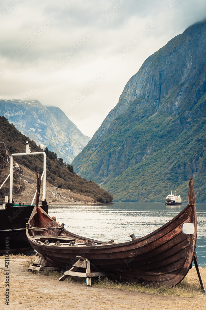 Old wooden viking boat in norwegian nature