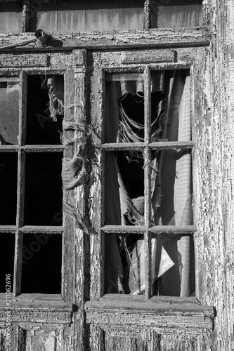 Weathered door of abandoned house, Bulgaria photo