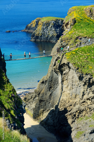 Carrick-a-Rede Rope Bridge, famous rope bridge near Ballintoy in County Antrim, linking the mainland to the tiny island of Carrickarede photo